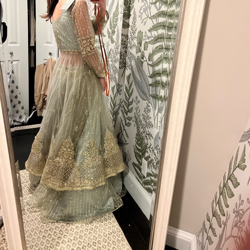 Lehenga. Brand new, didn’t have time to get fitted. Small.